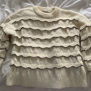 Ladies sweater size small. Made in turkey. Scalloped details in black.